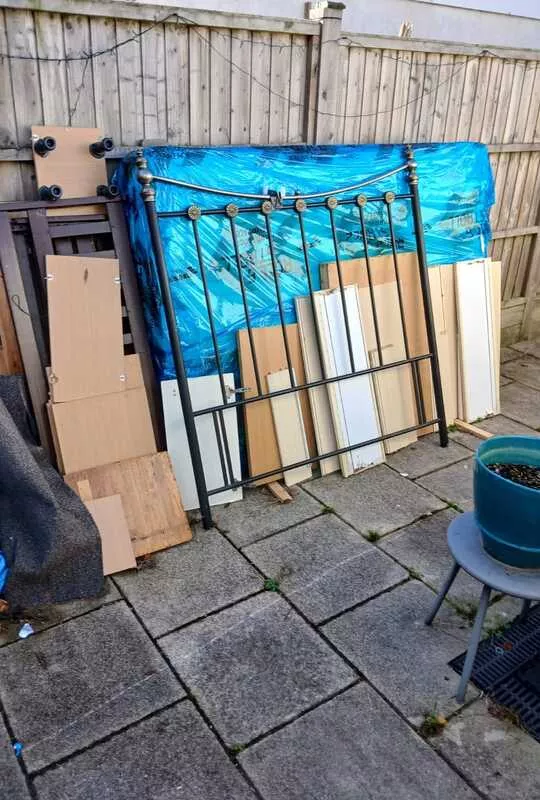 Garden junk removed before